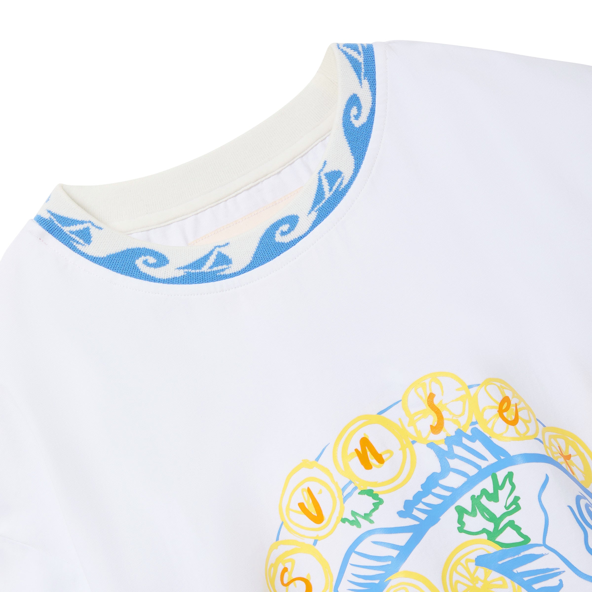 Close-up of a white shirt with colorful patterns on a white background