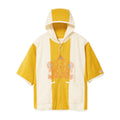 Yellow and white poncho with a brand logo on a white background