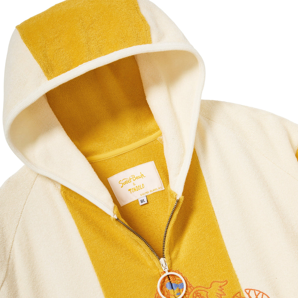 Close-up of interor label inside poncho. 